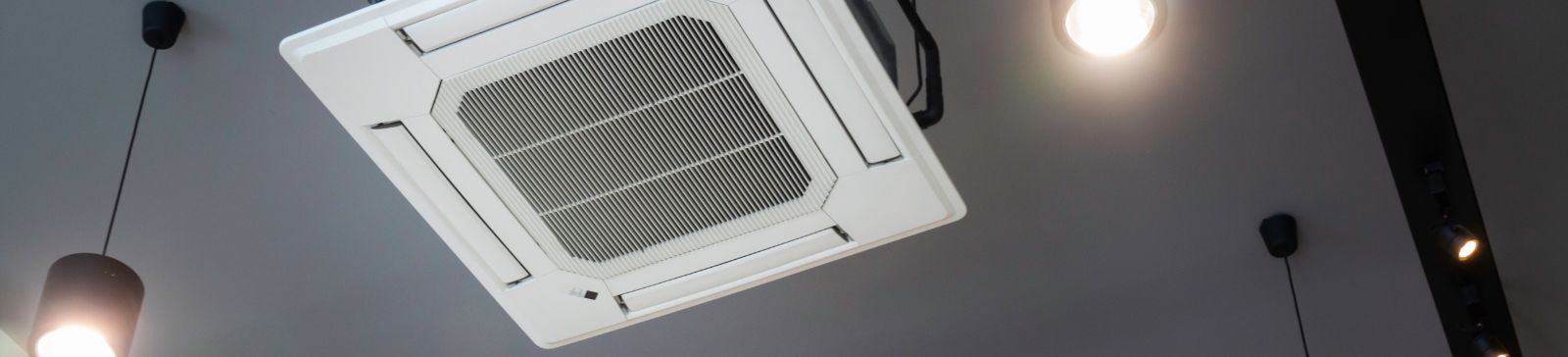 A close look at air conditioning vent on the ceiling